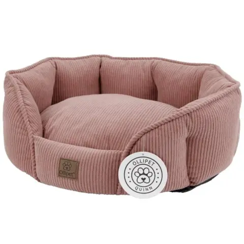 Flot Rosa farvet hundeseng med aftagelig pude i bunden.