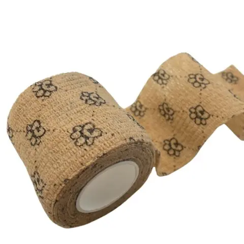 Smart bandage til hunde med sødt poteprint. Beskytter poter og sår.