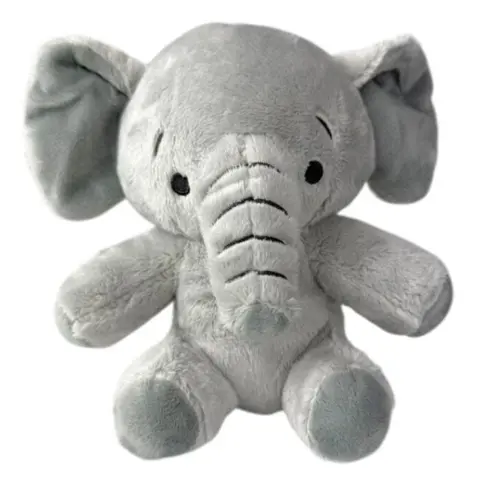 En sød lille elefant som er et blødt stykke hundelegetøj uden piv.